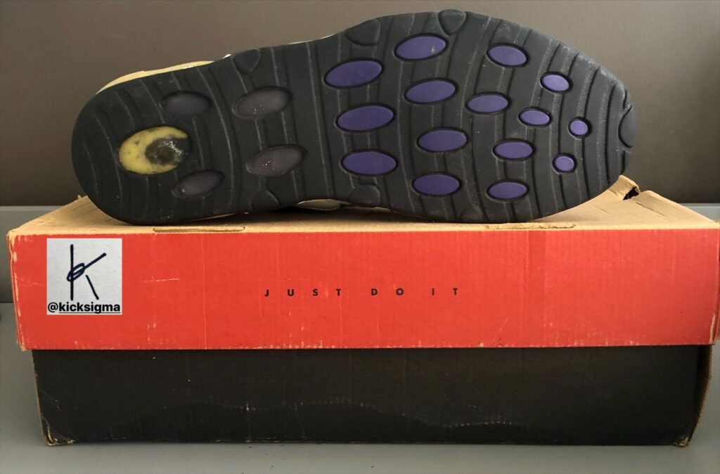The Nike Air Max Uptempo, black, white, dark concord, right shoe bottom view. 