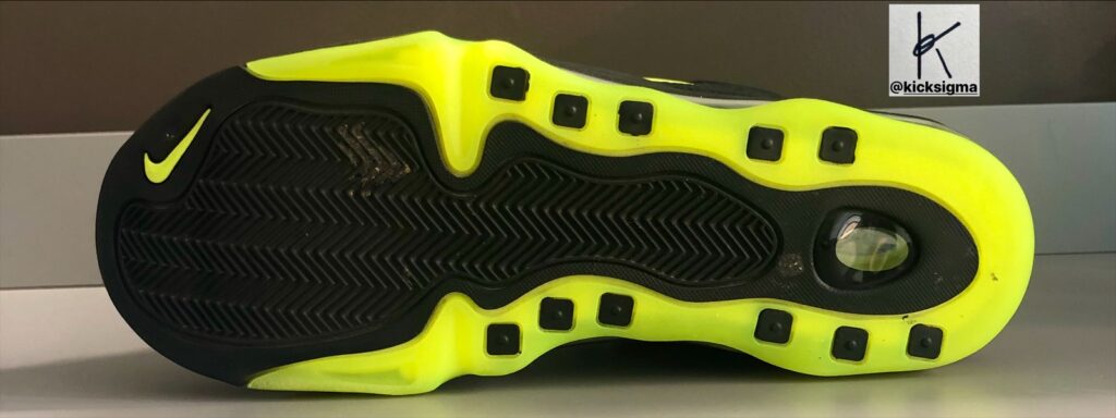 The Nike Air Total Max Uptempo, black, volt colorway, bottom view. 