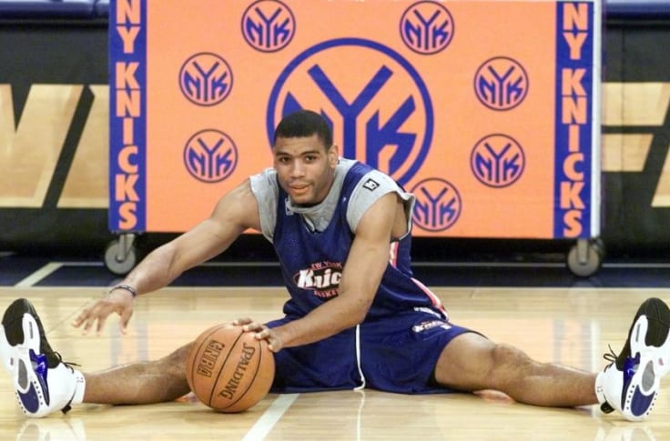 Allan Houston wearing the Nike Air Vis Zoom Uptempo in the black, white, royal, silver colorway.  