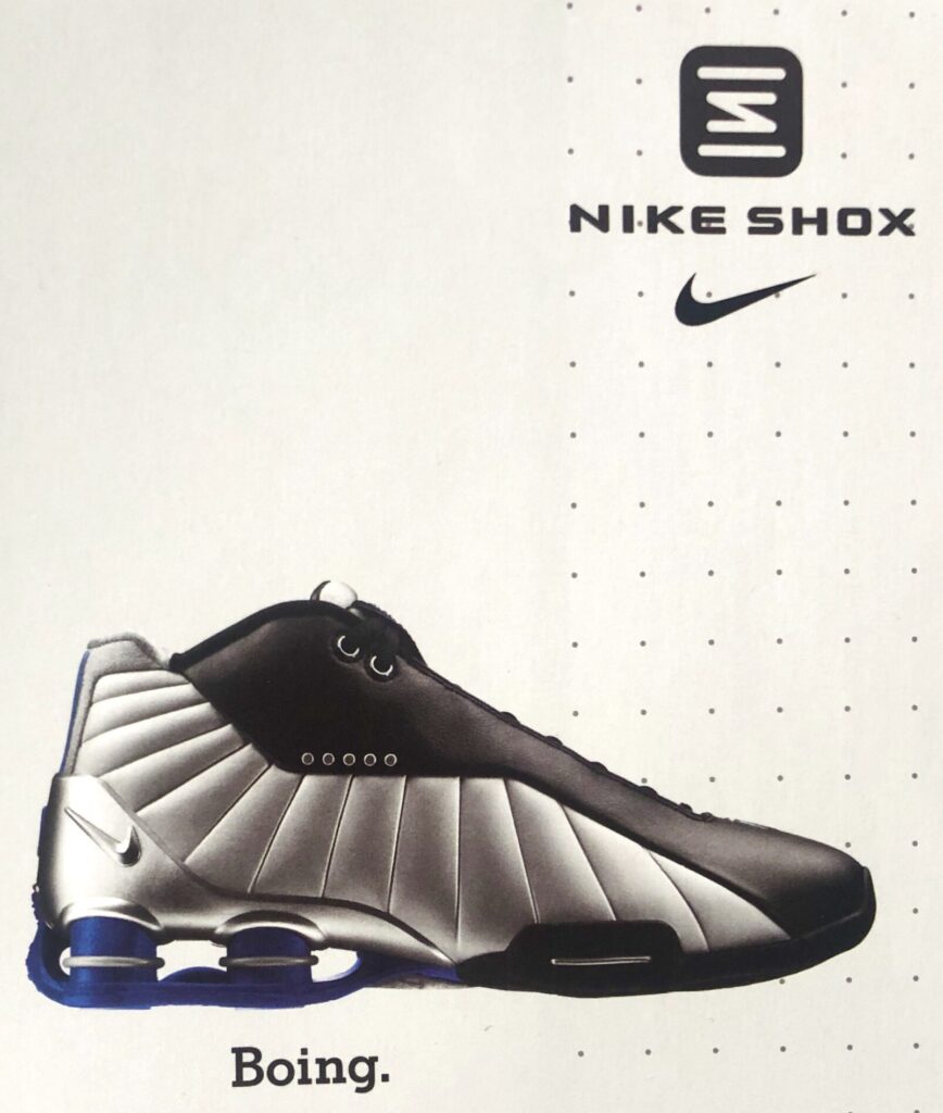 Nike Ad featuring the Nike Shox BB4, black, silver, lapis colorway. 