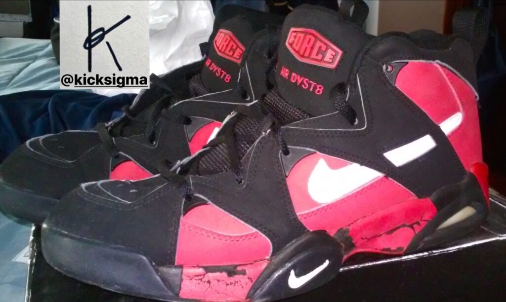Nike Air DVST8 in the black, white, true red colorway, left lateral view. 