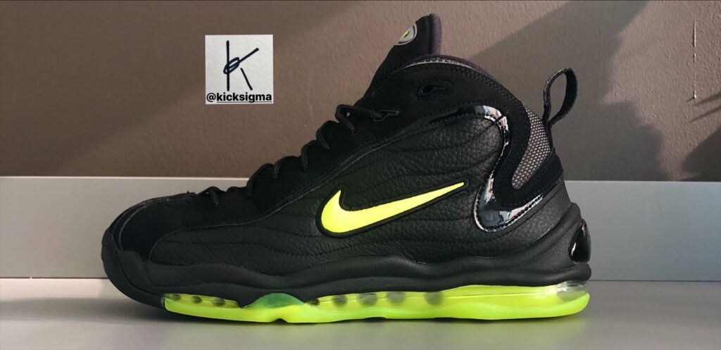 The Nike Air Total Max Uptempo, black, volt colorway, lateral view. 