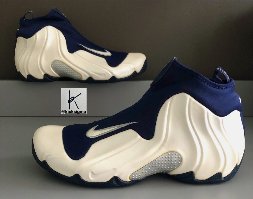 The Nike Flightposite, white, navy colorway, lateral view. 