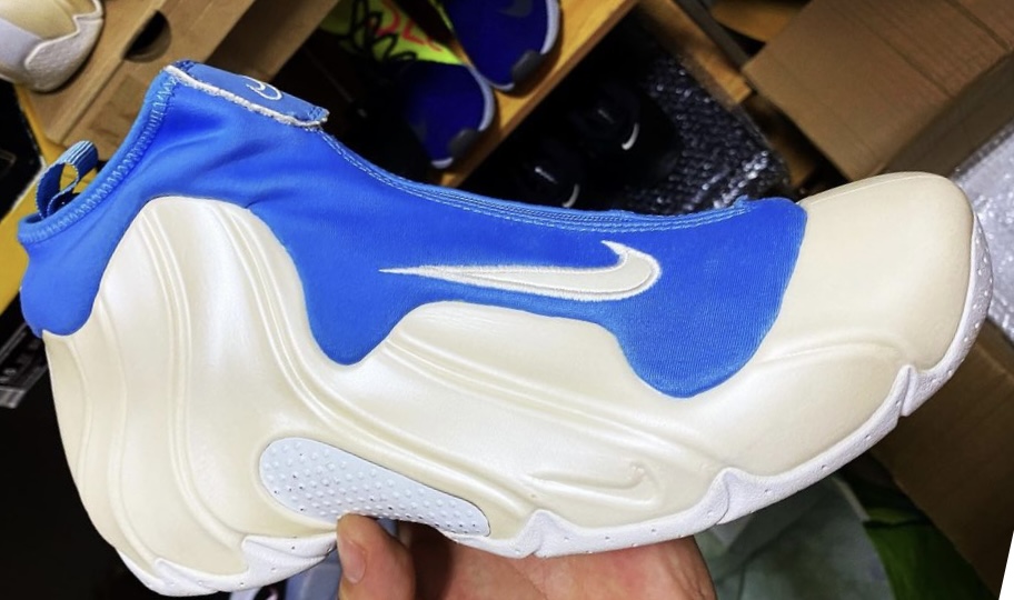 The Nike Flightposite, white, university blue colorway, lateral view. 