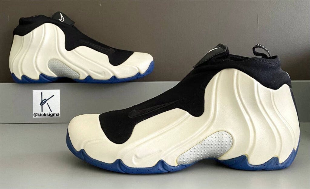The Nike Flightposite TB, white, black, royal colorway, lateral view. 
