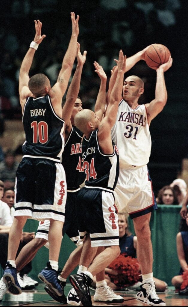 Scot Pollard wearing the Nike Air Max Uptempo 3 while at Kansas. 