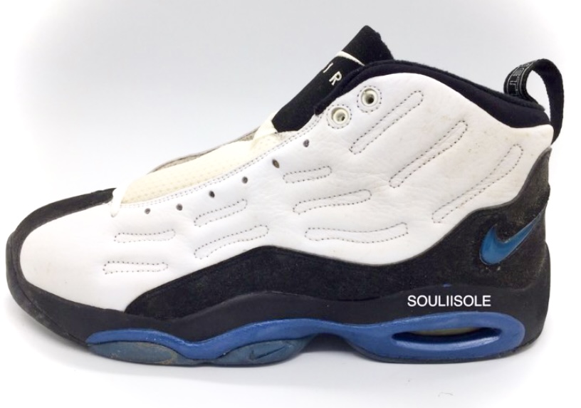 Nike Air Garnett in the white, black, blue colorway, lateral view. 